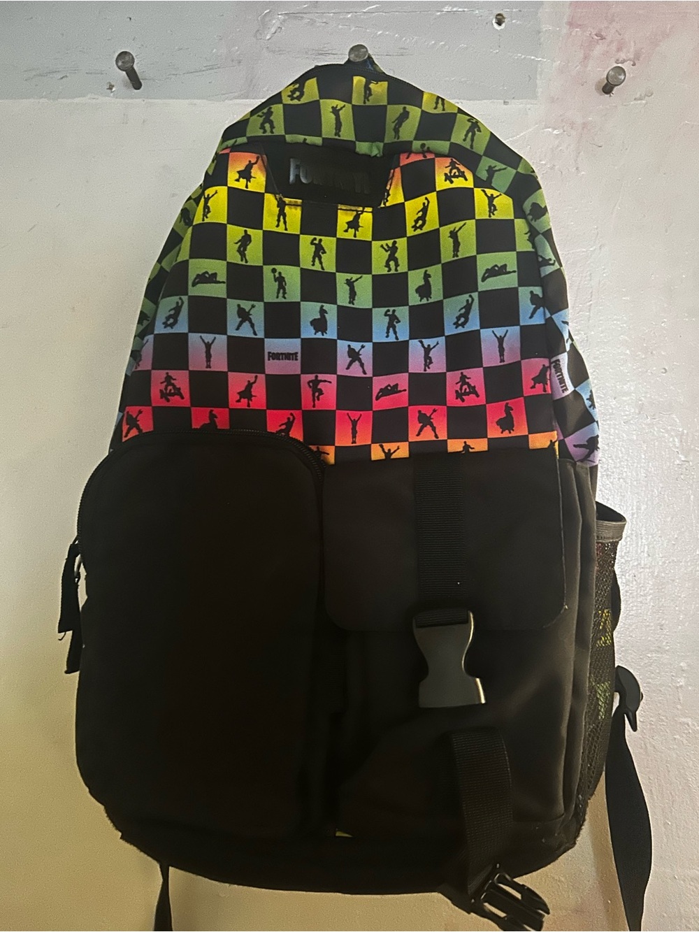 Black Backpack with Rainbow Checkerboard Pattern
